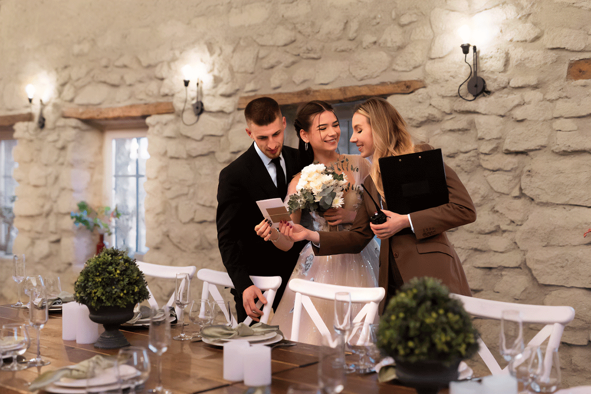 Event coordinator with a nuptial couple